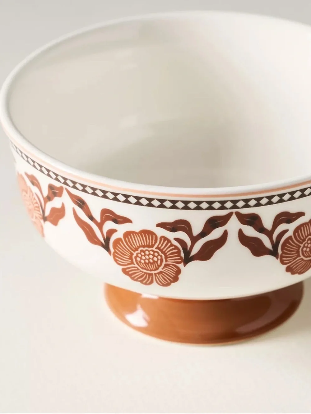 Anthropologie stoneware footed